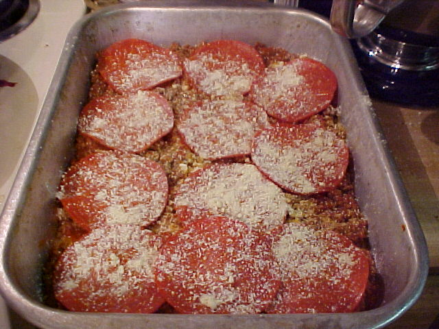Sprinkle parmesan on top of sauce and pepperoni