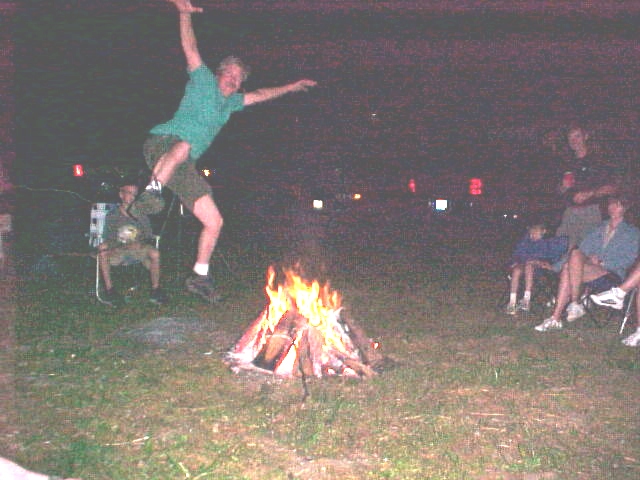 Tim leaps over the flames